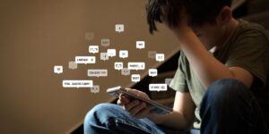 teen struggling on phone internet use