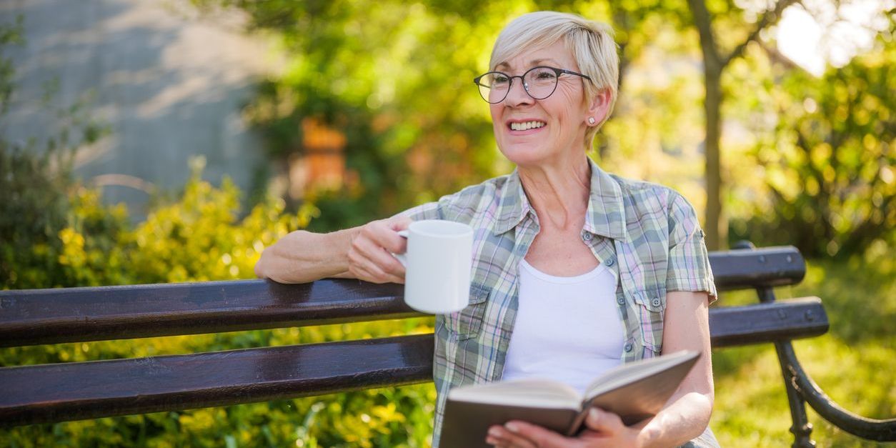 older woman drinking coffee