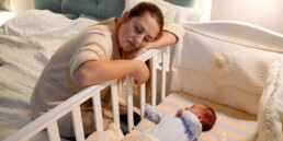 mom with depression at home with baby