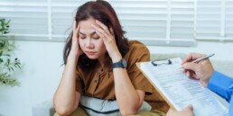 patient with anxiety in psychiatrist office