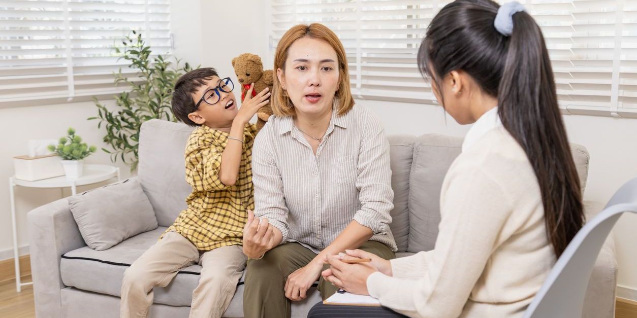 mother meeting with son and therapist about adhd