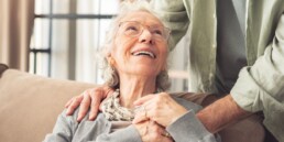 elderly woman with dementia with caregiver