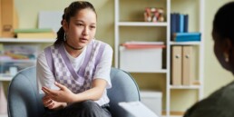teen with depression visiting a psychiatrist